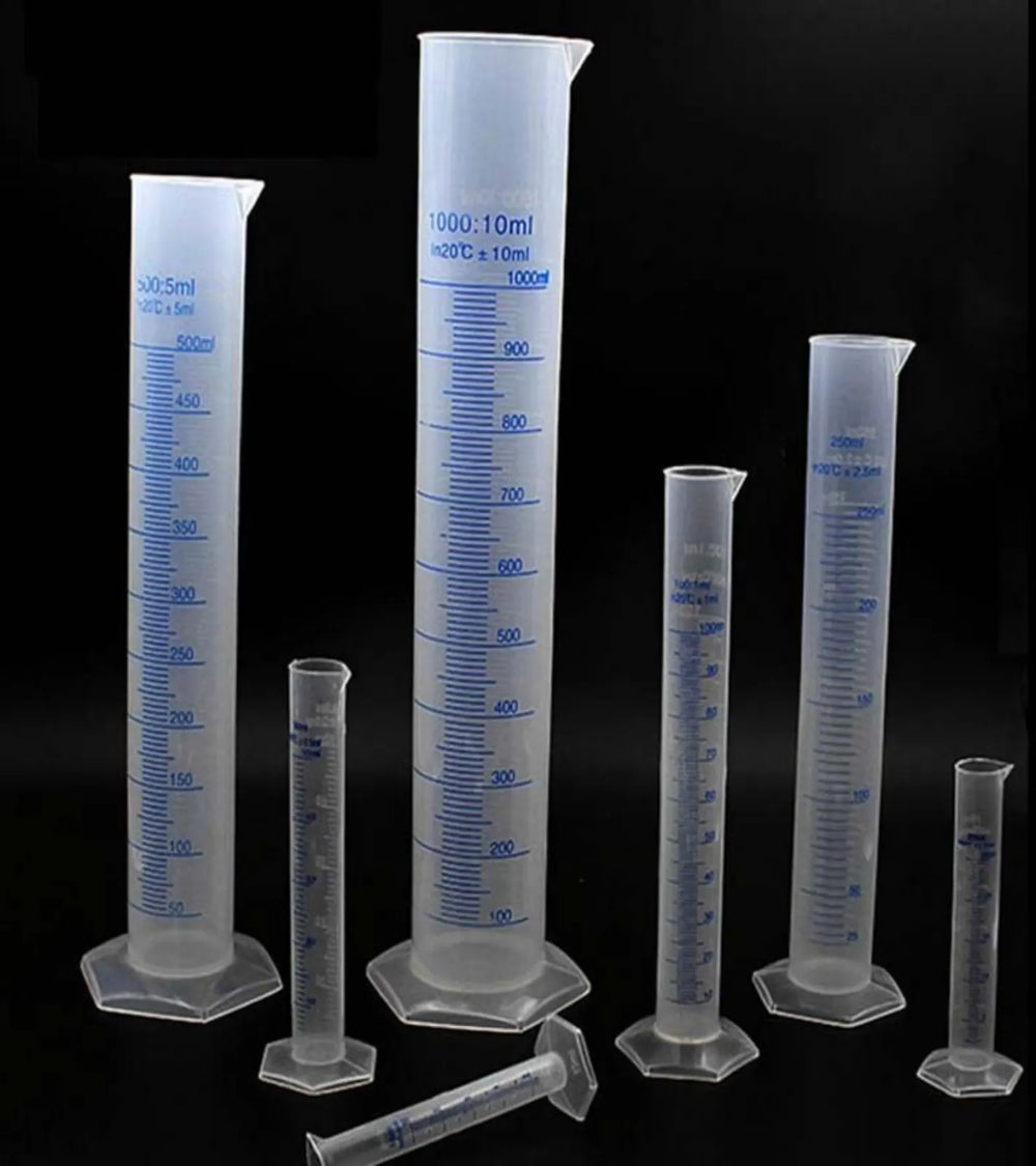 Set of plastic milk checker cylinders in different sizes for testing