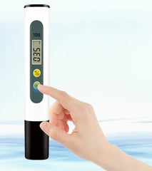 Digital TDS water tester meter with LCD display for checking water quality.
