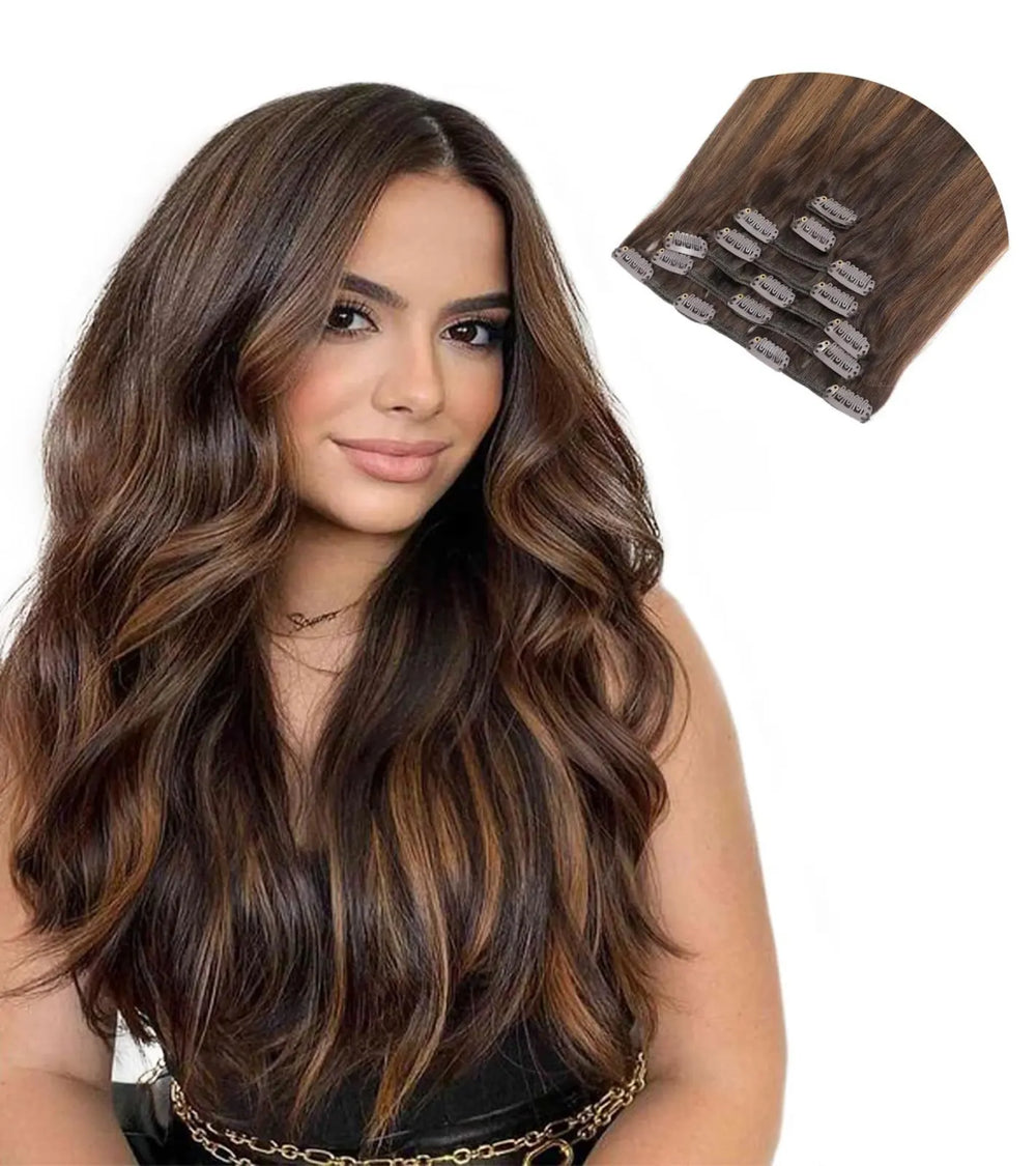 Woman with long dark brown wavy hair wearing matching clip-in hair extensions