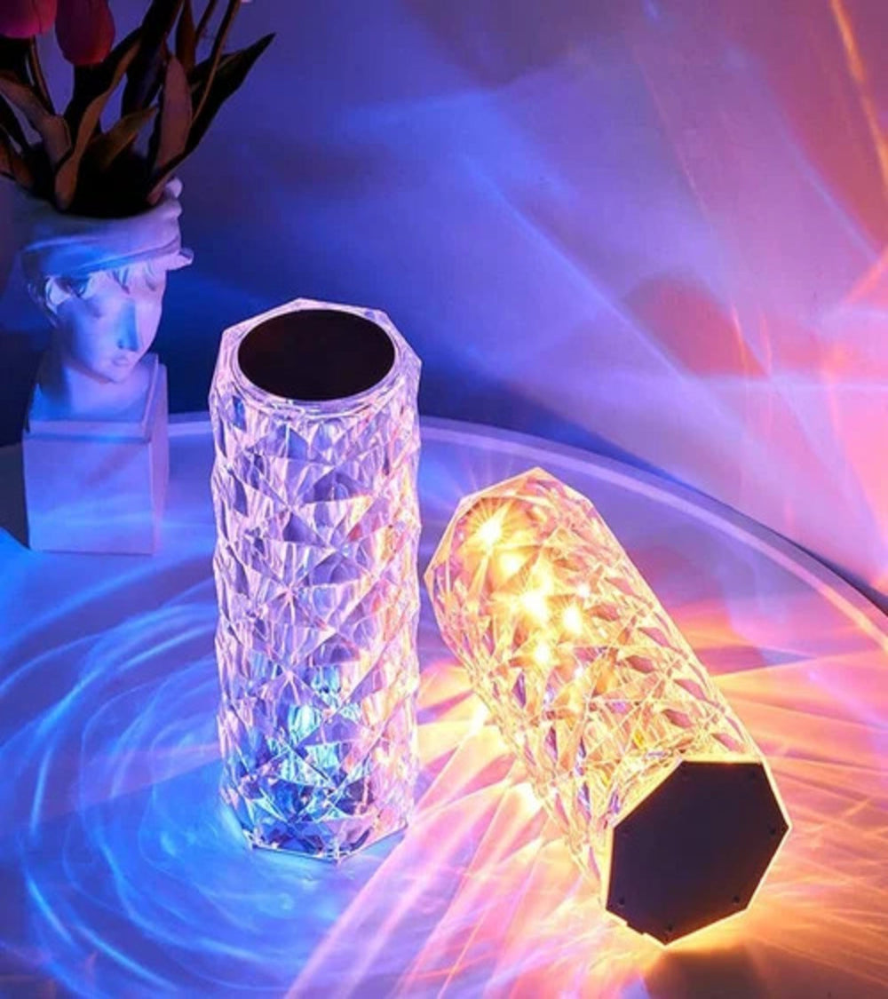 LED crystal table lamps displaying colorful light effects in blue and warm tones
