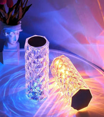 LED crystal table lamps displaying colorful light effects in blue and warm tones
